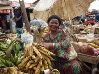 Selling bananas at a market in Cameroon Selling bananas at a market in Cameroon