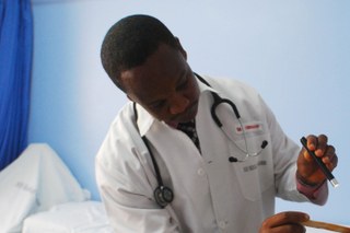 Doctor treating a patient Doctor treating a patient