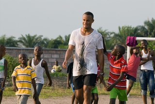 Vincent Kompany playing football with children from Kinshasa