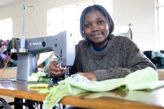 Girl learning to sew in Nairobi Kenya 30460 Girl learning to sew in Nairobi Kenya 30460