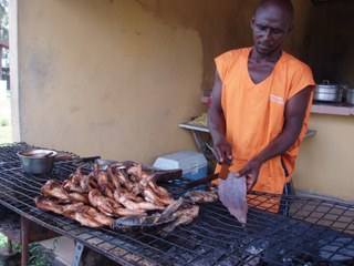 A man frying fish