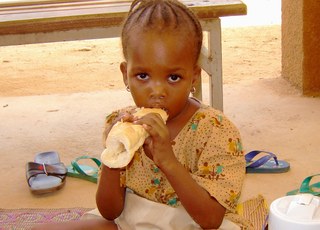 A small child eating, Niger
