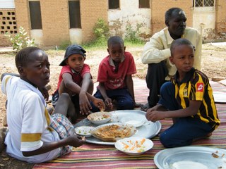 Eating Sudanese food