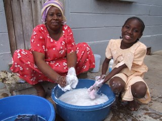 Washing clothes by hand